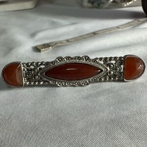 Art deco style silvertone bar pin with rust stones